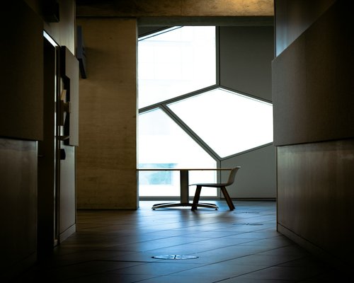 Minimalist desk interior showing clean lines and soft lighting